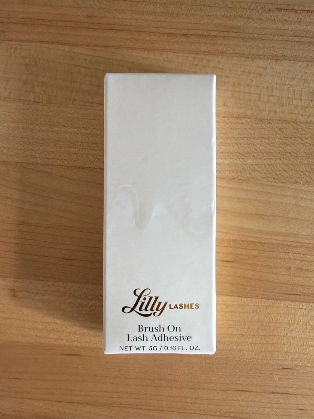 Lilly Lashes White & Gold Brush-On Lash Adhesive Packaging